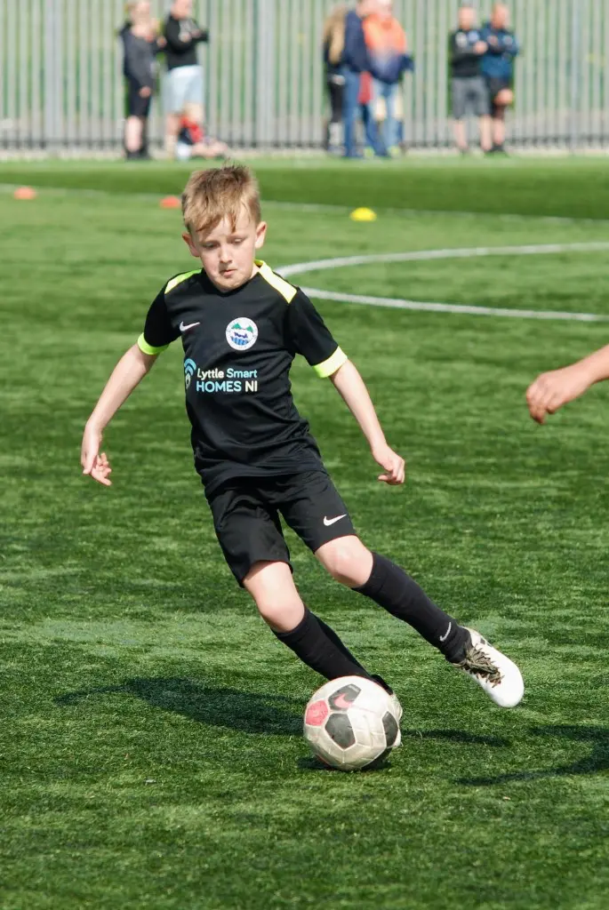 Player dribbling on the astro pitch