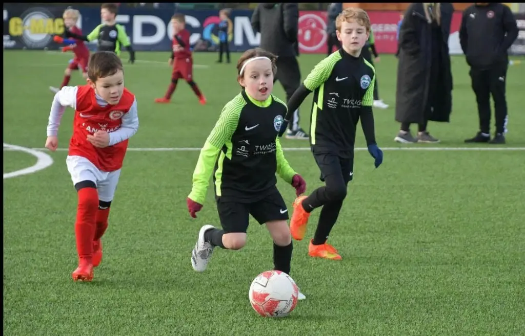 Glens United player on the ball during a match