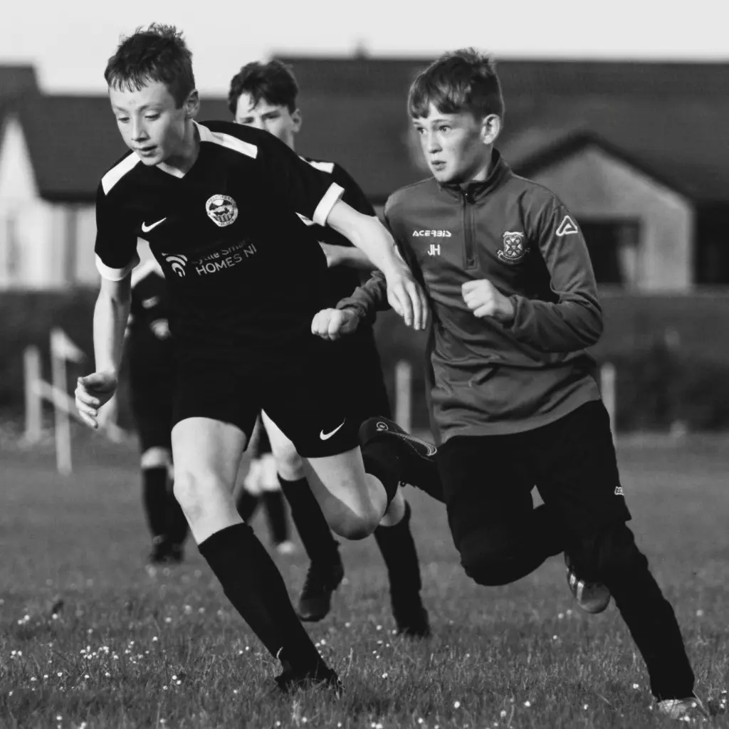 Monochrome action from a youth match